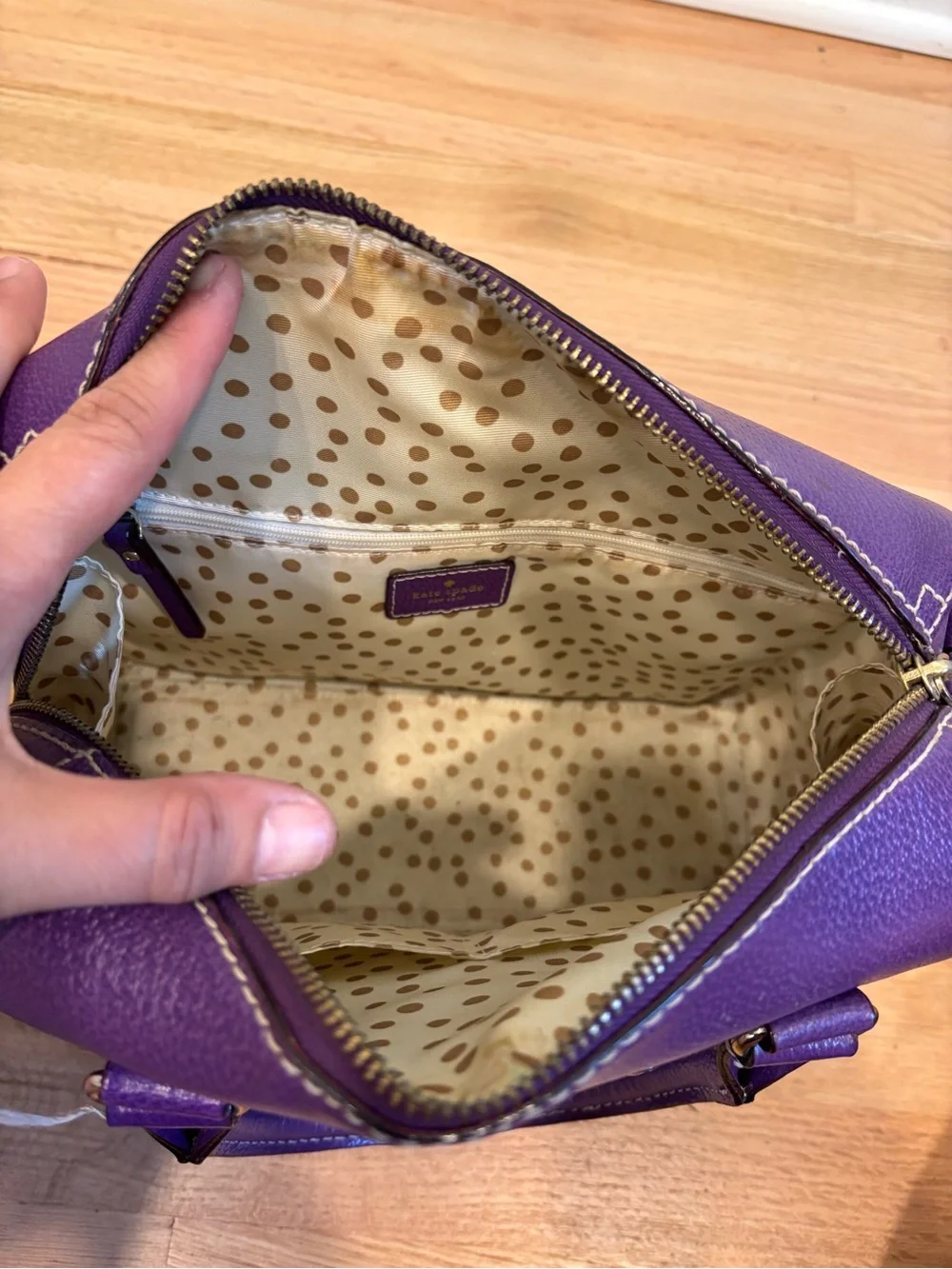 Kate Spade Alessa Wellesley handbag in a vibrant plumberry purple leather